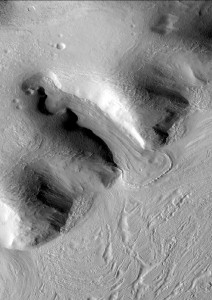 Fig. 5. Composite CTX (~6 m/pixel) image of glacierised crater Greg (centred 38.65 oS; 112.98 oE). Located in the southern hemisphere of Mars this crater hosts many well developed GLFs on its wall. Highlighted in the right centre of this composite image is one of the most studied GLFs on Mars (see Hubbard et al., 2011 and references therein). Image is orientated north up and illumination is from the west. (Image made using the free GIS viewer, JMARS)