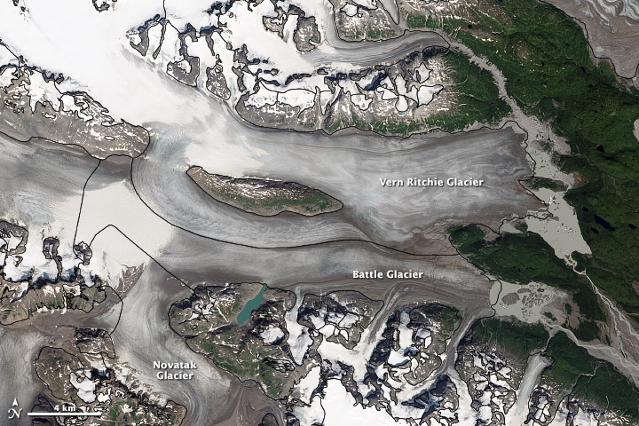 Landsat 8 image of the Battle Glacier Complex, Alaska. The value of the GLIMS method is shown, with the glacier outlines mapped onto the glacier in detail. From the NASA Earth Observatory.